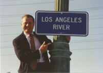 Tom LaBonge with the Los Angeles River sign