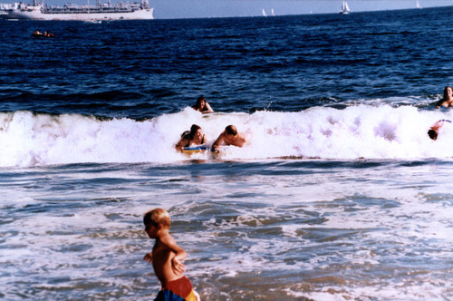 Body surfing in Long Beach waves