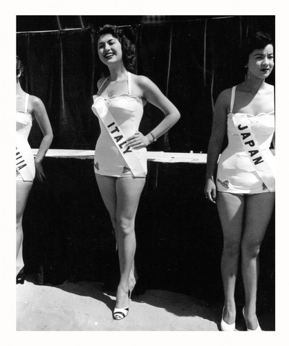 Contestants pose in swimsuits