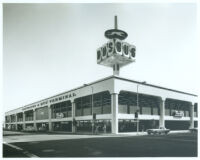 Greyhound [& RTD] Bus Terminal, including Thrifty Drug Store, exterior view street level from across intersection