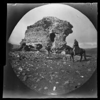 William Sachtleben riding a horse and Thomas Allen with his bicycle next to a Roman ruin, Ankara vicinity, Turkey, 1891