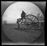 William Sachtleben or Thomas Allen unloading bicycles from a cart after crossing the Zeravshan River on the road from Samarqand to Chinaz, Uzbekistan, 1891