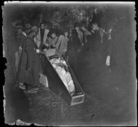 Armenian massacre victim in a coffin in the Armenian Gregorian Cemetery, Erzurum, Turkey, 1895