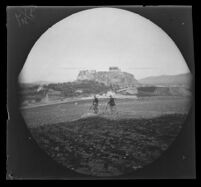 William Sachtleben and Thomas Allen on Philopappos Hill with the Acropolis in the distance, Athens, 1891