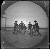 William Sachtleben and Thomas Gaskell Allen Jr. pose with their bicycles, a seated wman and 2 men, Asia, 1891