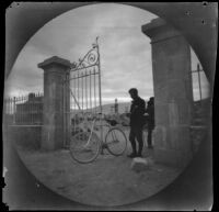 William Sachtleben at the modern gate to the enclosure of the Street of Tombs, Athens, 1891