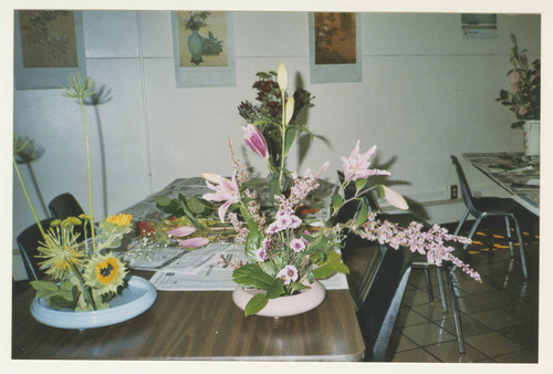 Flower arrangement program : Two semi-tropical arrangements on a table ...
