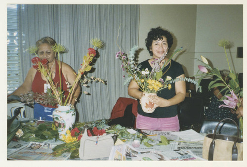 Flower arrangement program : Two people and their flowers — Calisphere