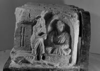 Buddha seated in a cave