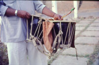 Gondhal and Jāgran ceremony - sambal drum pair with sticks held by ...