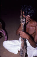 Sarpam Thullal Pulluvan Serpent Ritual - O. K. Raman holding a Pulluvan ...
