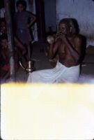 Kunyāttu Kārnavar playing a kuzhal, a double-reed wind instrument ...