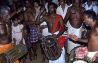 Kunyāttu Kārnavar playing a kuzhal, a double-reed wind instrument ...