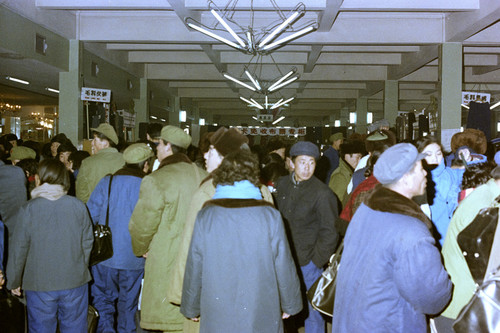 Crowded Clothing Department in the Dongfeng Market, Beijing