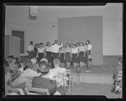 Leo Christiansen leading the California Labor School Chorus