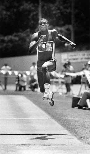 Carl Lewis competing in the long jump