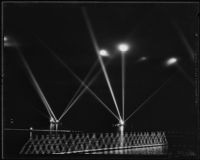 Lights from United States Fleet illuminate night sky, San Pedro, 1935