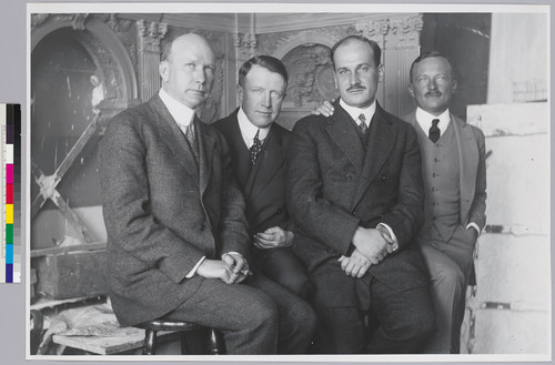 John Bakewell Jr., Arthur Brown Jr., Jean-Louis Bourgeois, and John Baur in front of a scale model of part of the San Francisco City Hall