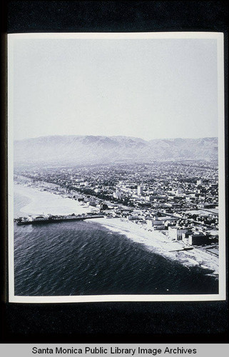 Aerial view of the Santa Monica Pier looking north to the Santa Monica Mountains (from the Los Angeles Examiner newspaper)
