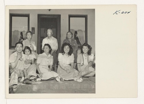 This picture was taken on the front porch of Harold Ouye's home at 2211 Thirteenth Street, Sacramento, California. The Hayashi