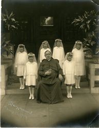 Bishop John Cantwell and first communicants