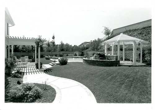 Backyard garden, pool, and gazebo in an Oak Park home