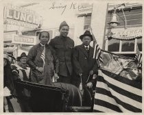Sing Kee with his parents in a post-war parade