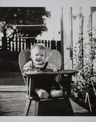 Kay Minette Evans sits in her highchair, Petaluma, California, 1948