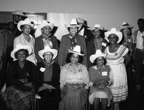 Men and women wear cowboy hats, Los Angels, 1983