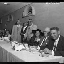 People seated at a banquet table