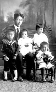 man and four children