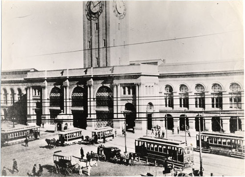 [Streetcars parked in front of the Ferry Building]