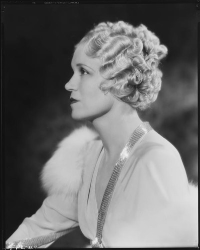 Peggy Hamilton modeling a formal coiffure hairstyle by Weaver Jackson's Salon, 1933