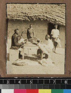Tailors at work outdoors, Kambole Mission, Zambia, ca. 1925