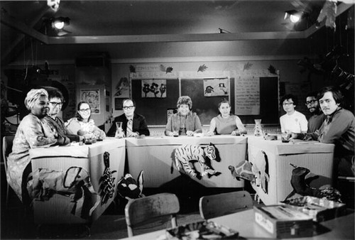 [Group of people participating in a panel discussion at Argonne School]