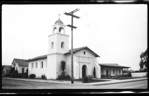 Exterior view of the chapel and bell tower at Mission Santa Cruz, 1934