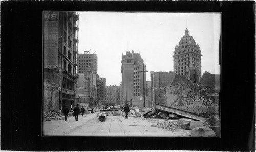 [Ruins of buildings destroyed in the 1906 earthquake and fire on Geary Street, looking east towards Market Street]