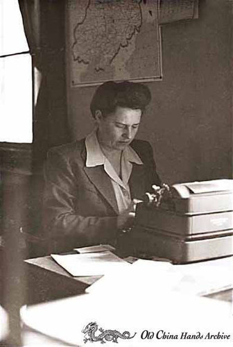 Secretary Ludmilla Luvdorski at work at the Civil Affairs Office
