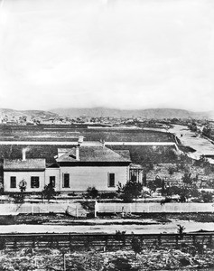 View of Los Angeles looking north from around Eleventh Street and Main Street, showing William H. Workman's house, 1873
