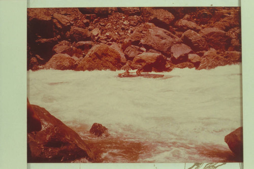 Hal and Jean Bennett in Vulcan Rapid after the hole near the right bank had turned the kayak around