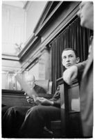 Boy Scout Frank Portune testifies for the court regarding the discovery of the bodies of murdered children Jeanette Stevens and Melba and Madeline Everett. August 12, 1937