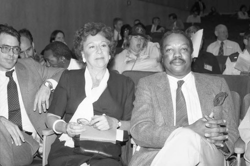 Paul Winfield and Jean Stapleton waiting to speak at a meeting on the homeless, Los Angeles, 1986