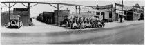 Employee group portrait outside Southern Lumber yard, c. 1930