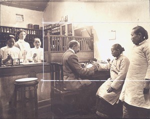 Medical missionary with patient, Hankou, China, ca. 1910-1920