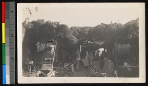 People gathered by shaded booths, China, ca.1904