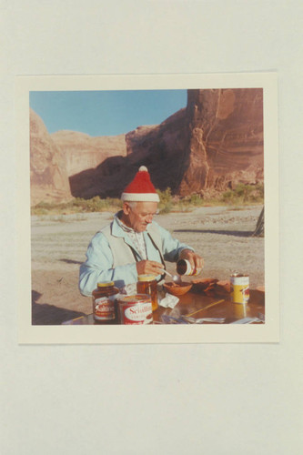 Harry Aleson prepares breakfast at the beach in front of The Chapel