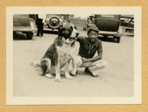 Takashi Ishida with a dog