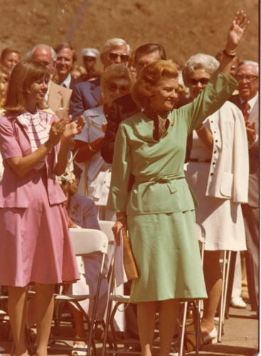 Betty Ford waiving during the dedication of the Firestone Fieldhouse, 1975
