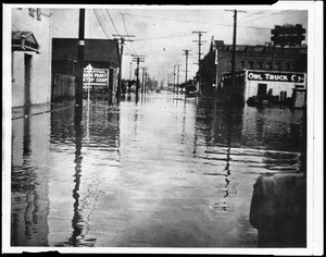 View of a flooded Tamarind Street looking from Compton Boulevard in Compton, 1924
