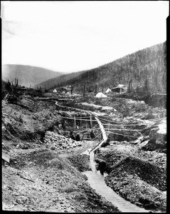 Sluicing at a placer mine, below Hunker, Alaska, ca.1894